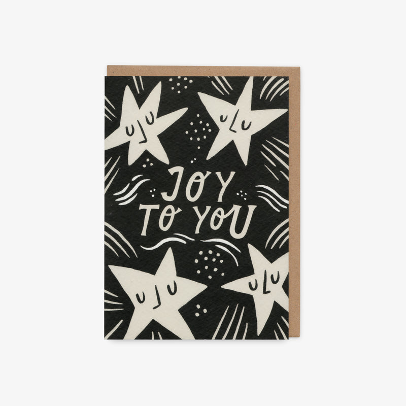 Greeting card with stars and 'Joy to You' text on a black background