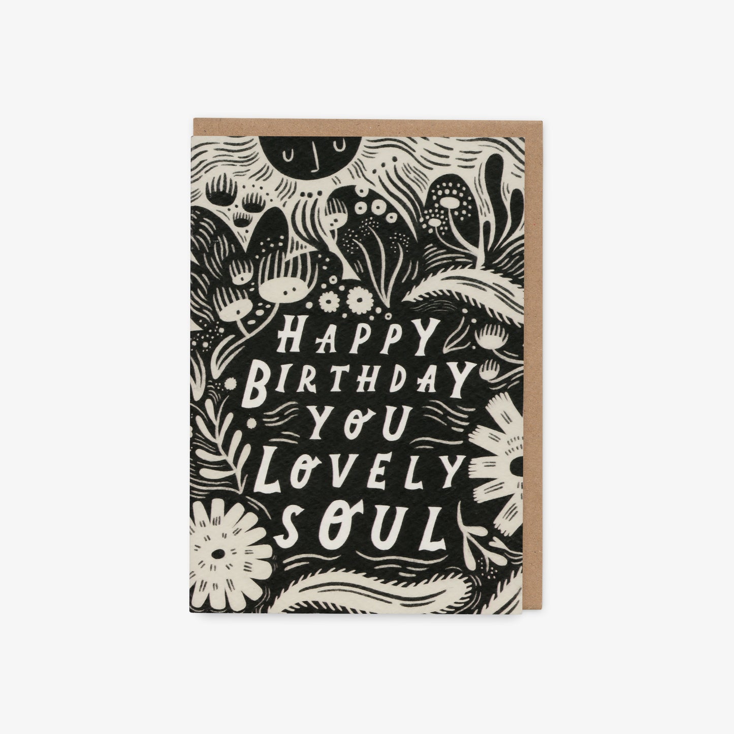 Greeting card with black and white design and text 'Happy Birthday You Lovely Soul' on a white background