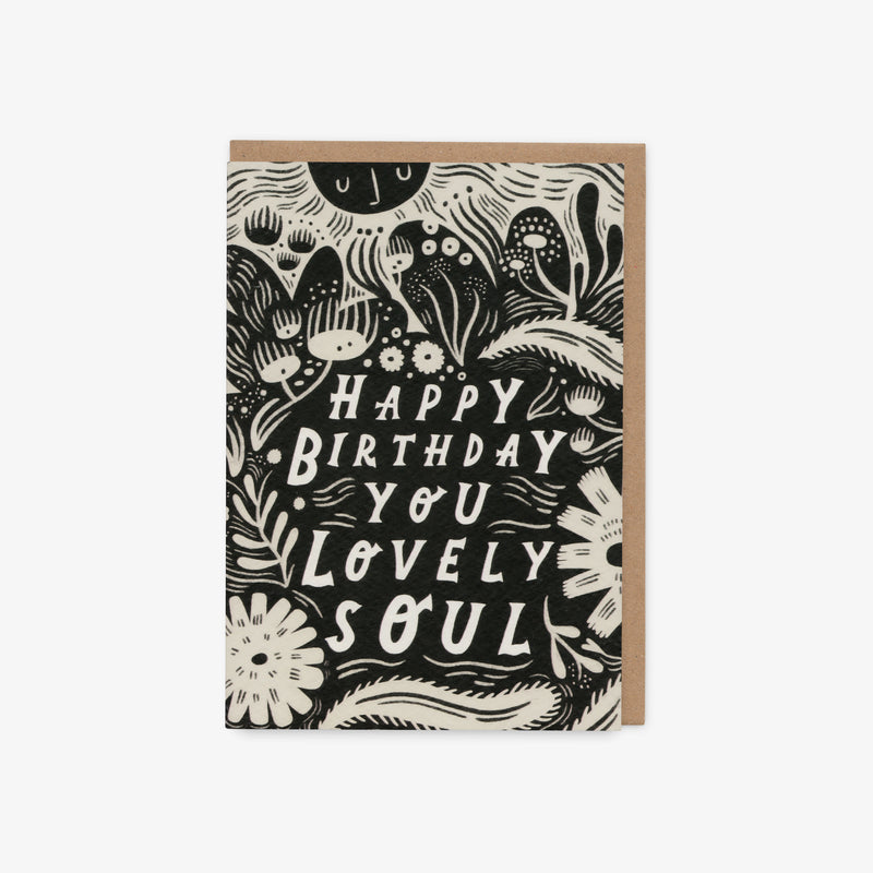 Greeting card with black and white design and text 'Happy Birthday You Lovely Soul' on a white background